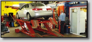 Car on Lift at Precise Auto Service